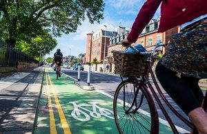 A picture containing outdoor, bicycle, person, riding
Description automatically generated